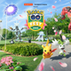 Ultra Beasts are stood in a grassy park, with Pikachu gambolling along in front.